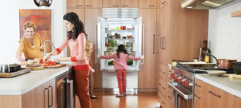women eating in kitchen